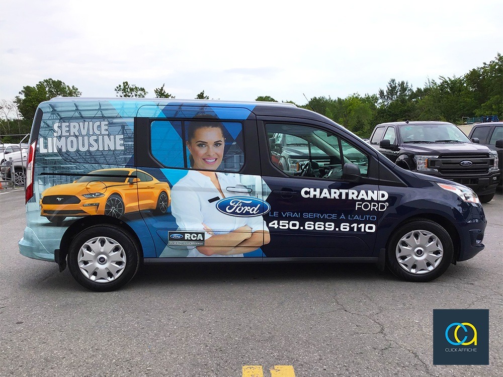 Vehicle wraps on blue 2018 Ford Transit Wagon XLT for Chartrand Ford in