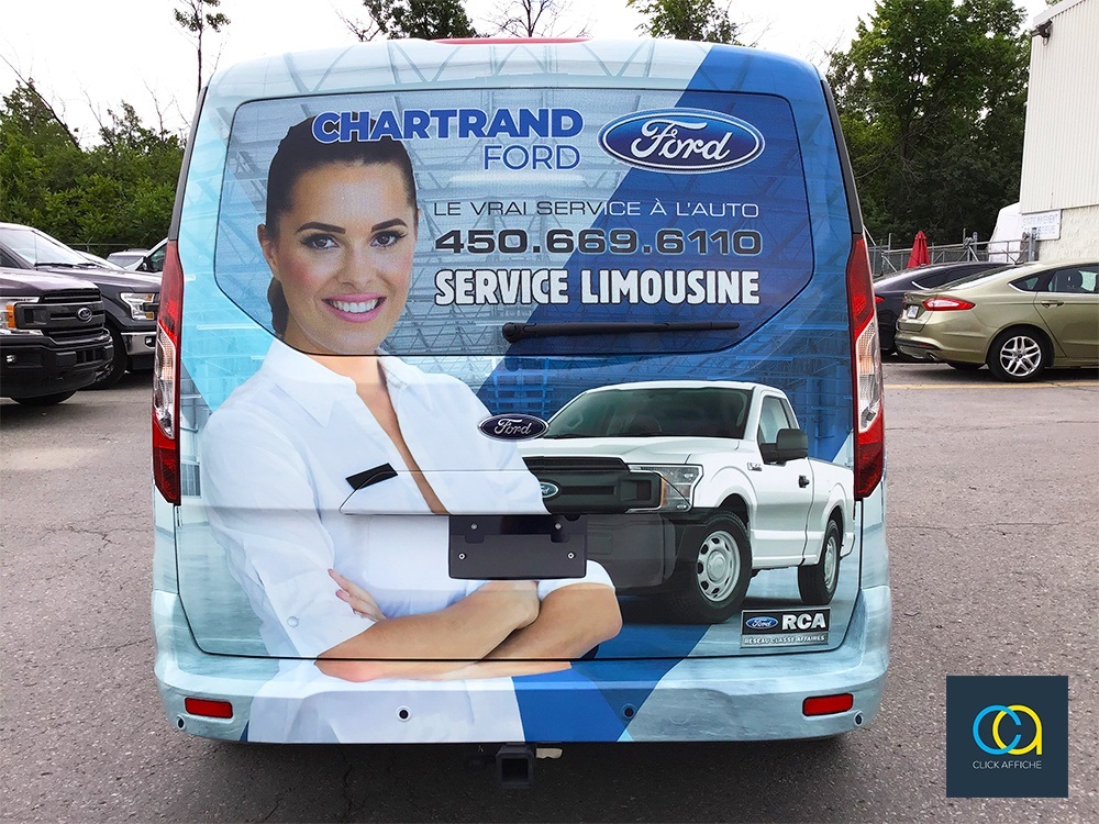 Vehicle wraps on blue 2018 Ford Transit Wagon XLT for Chartrand Ford in